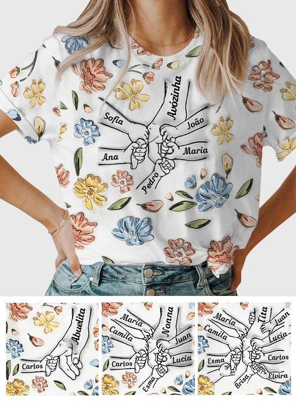 T-shirt personnalisé « Mains de maman tenant des fleurs pastel » avec motif floral pastel