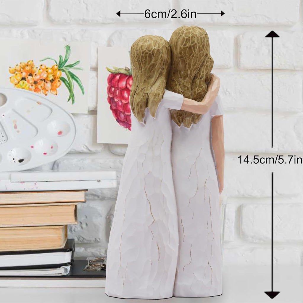 Figurine sculptée et peinte à la main représentant une mère et sa fille