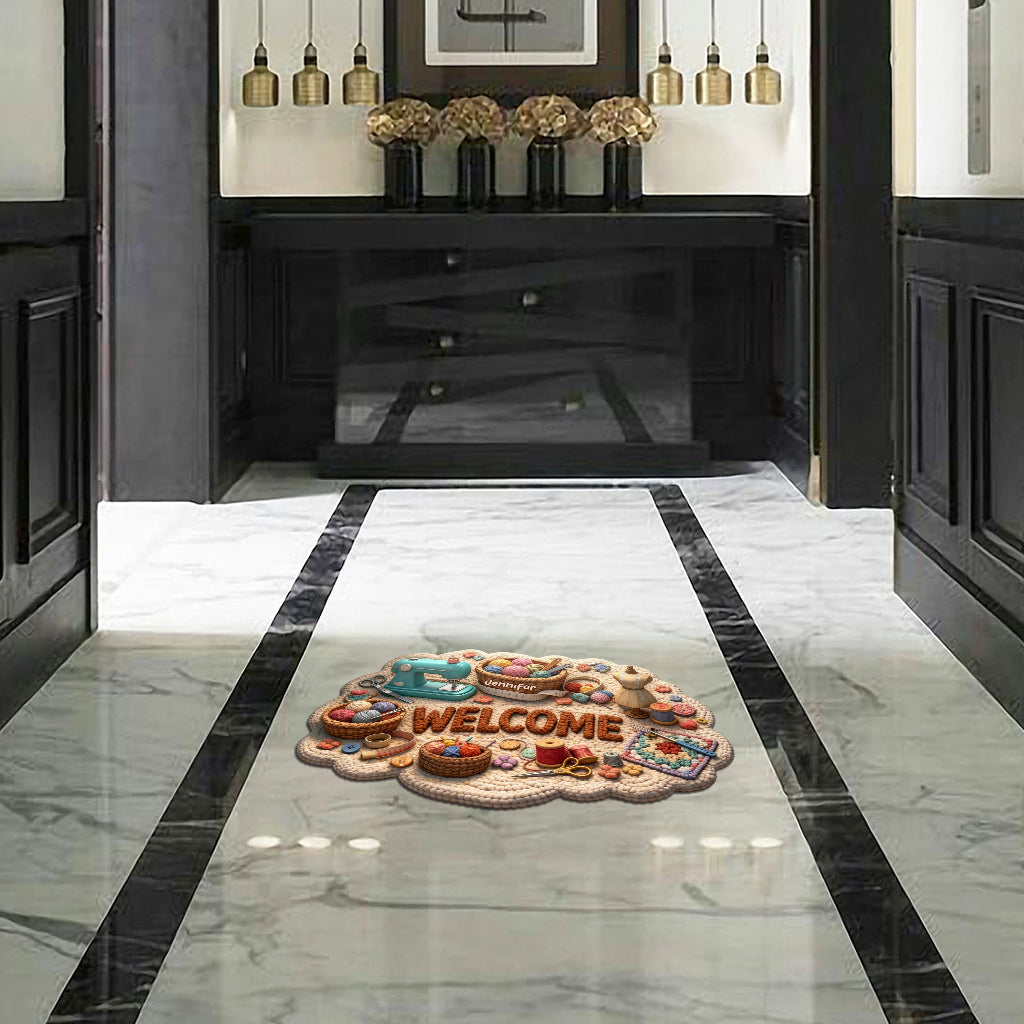 Cadeau idéal pour les passionnés de couture : paillasson/tapis de porte personnalisé en forme de point de couture.