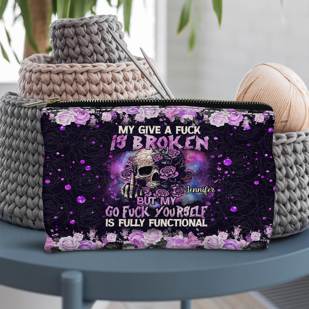 Mon « Je m'en fous » est cassé, mais mon « Va te faire foutre » est parfaitement fonctionnel ! – Pochette personnalisée en forme de crâne