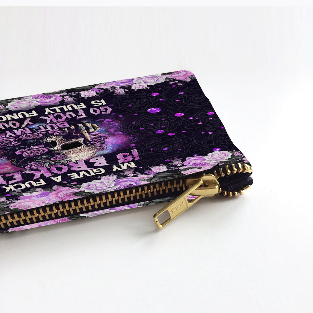 Mon « Je m'en fous » est cassé, mais mon « Va te faire foutre » est parfaitement fonctionnel ! – Pochette personnalisée en forme de crâne