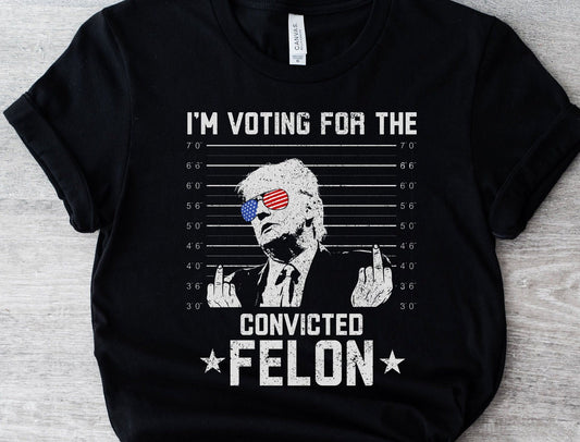 Je vote pour le condamné FeI0n Drapeau américain Trump T-shirt politique humoristique et satire électorale T-shirt et sweat à capuche