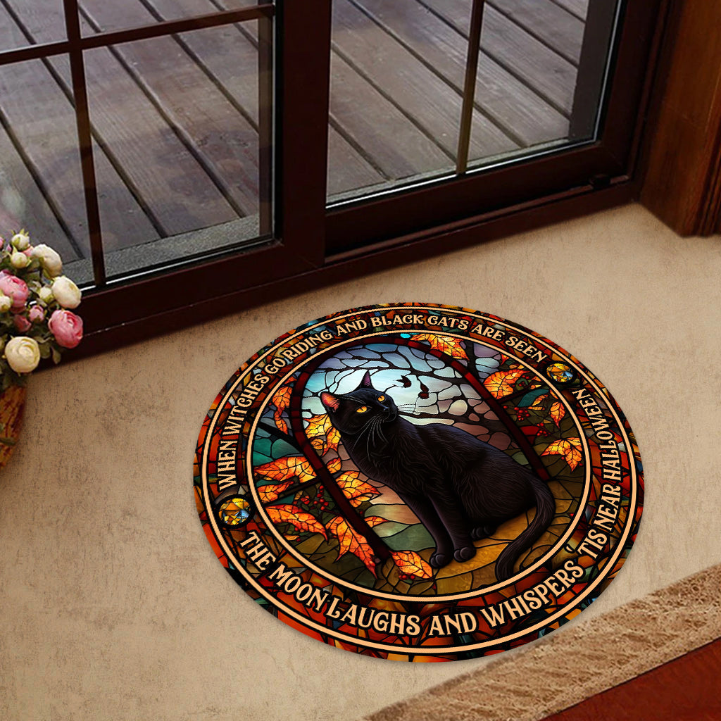 Quand les sorcières chevauchent et que les chats noirs rôdent, paillasson en forme de sorcière