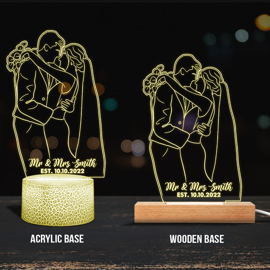 Socle lumineux personnalisé en forme de couple avec dessin au trait