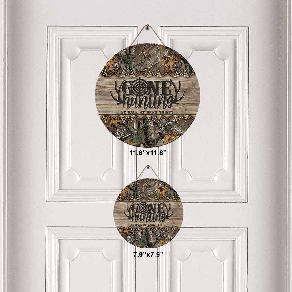 Panneau rond en bois « Parti chasser »