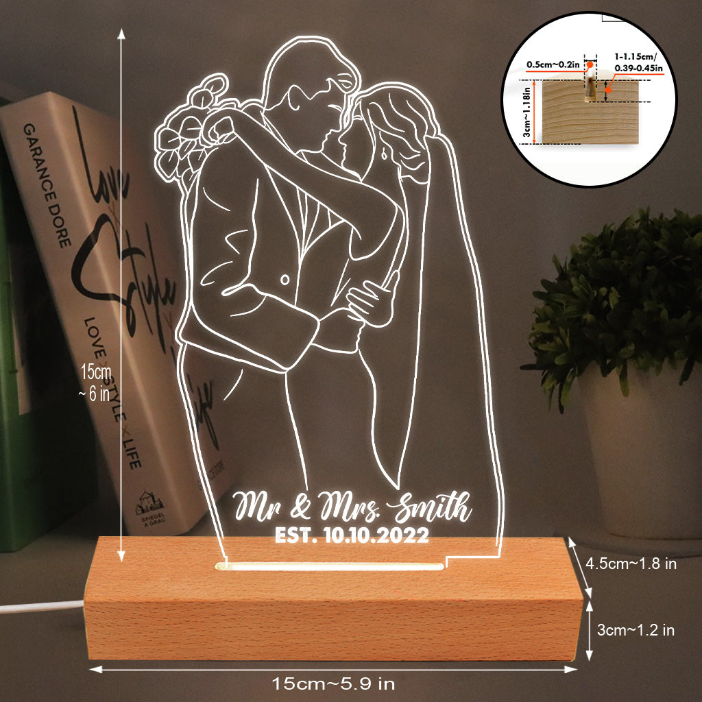 Socle lumineux personnalisé en forme de couple avec dessin au trait
