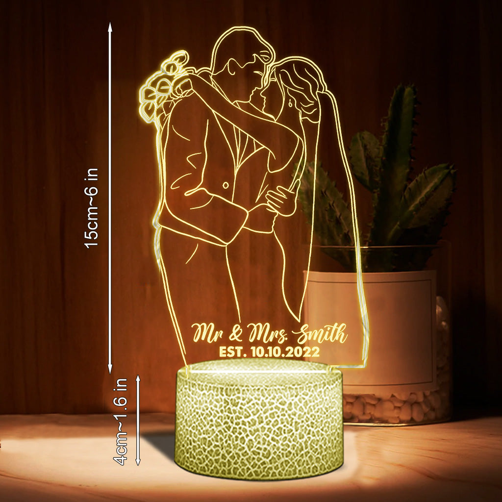 Socle lumineux personnalisé en forme de couple avec dessin au trait