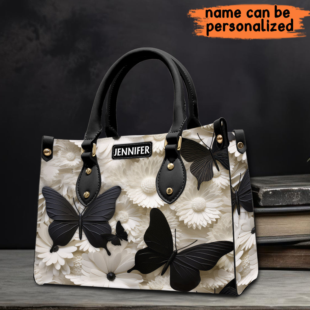 Sac à main en cuir personnalisé avec papillons et fleurs noirs et blancs élégants