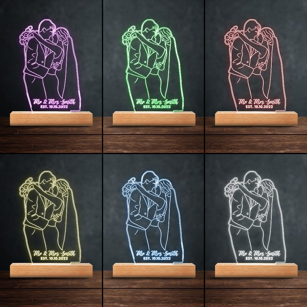 Socle lumineux personnalisé en forme de couple avec dessin au trait