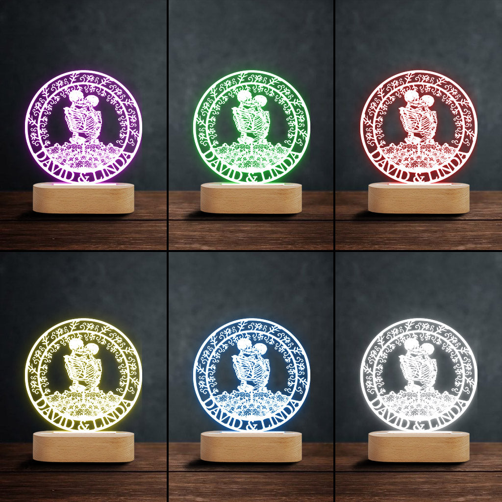 Couple de squelettes s'embrassant avec des roses - Plaque lumineuse personnalisée en forme de crâne