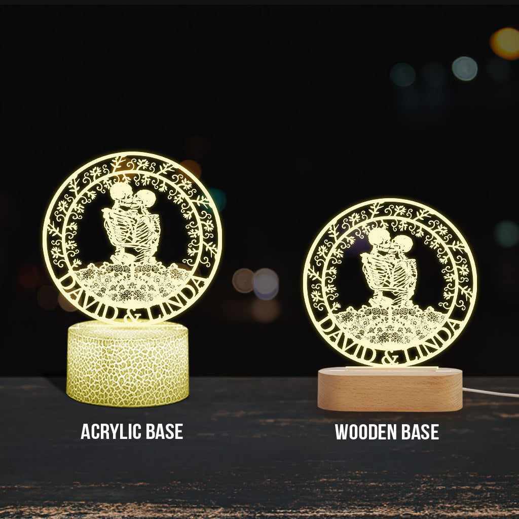 Couple de squelettes s'embrassant avec des roses - Plaque lumineuse personnalisée en forme de crâne